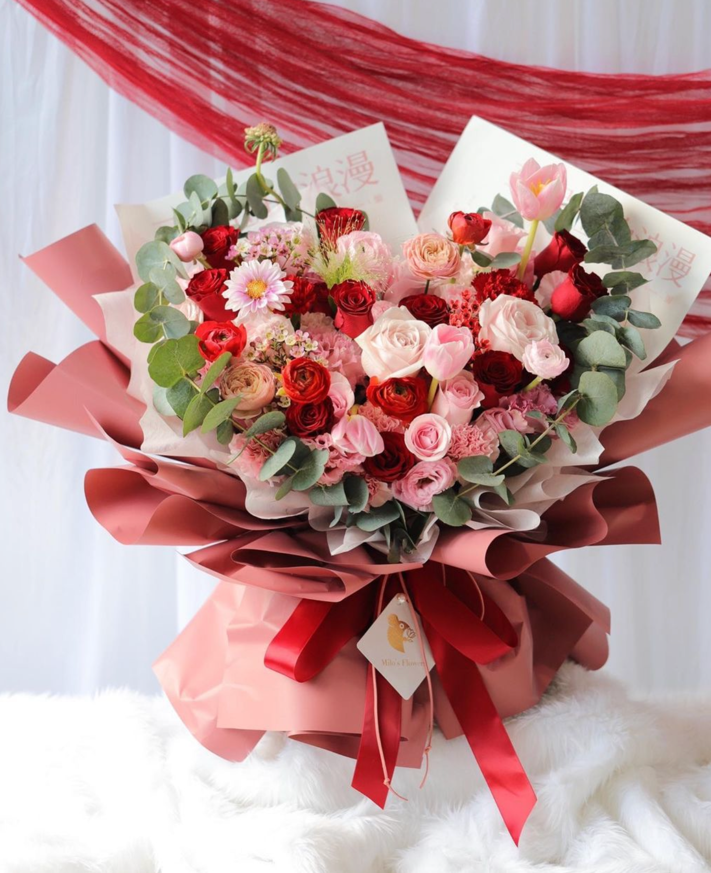 RED THOUGHTFUL SURPRISE