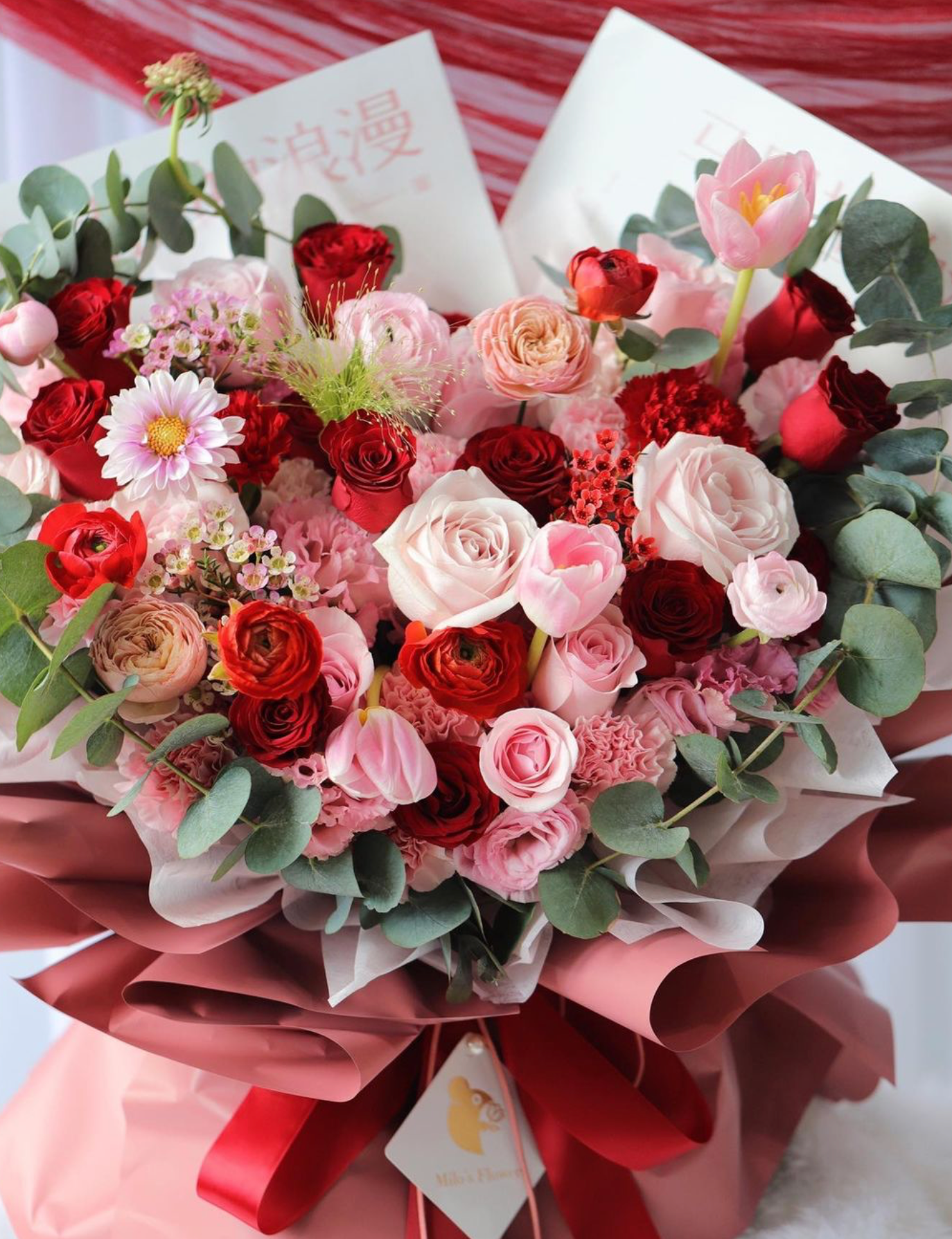 RED THOUGHTFUL SURPRISE